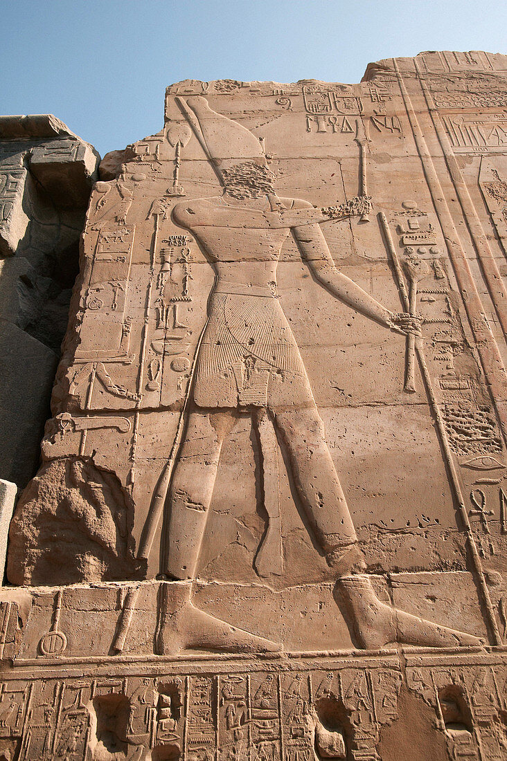 Carving of Egyptian priest in wall at Karnak. Luxor, Egypt.