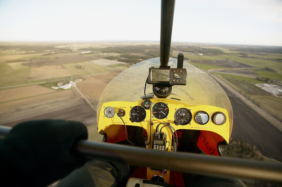 Trike flying over agricultural landscape. Gotland. Sweden.