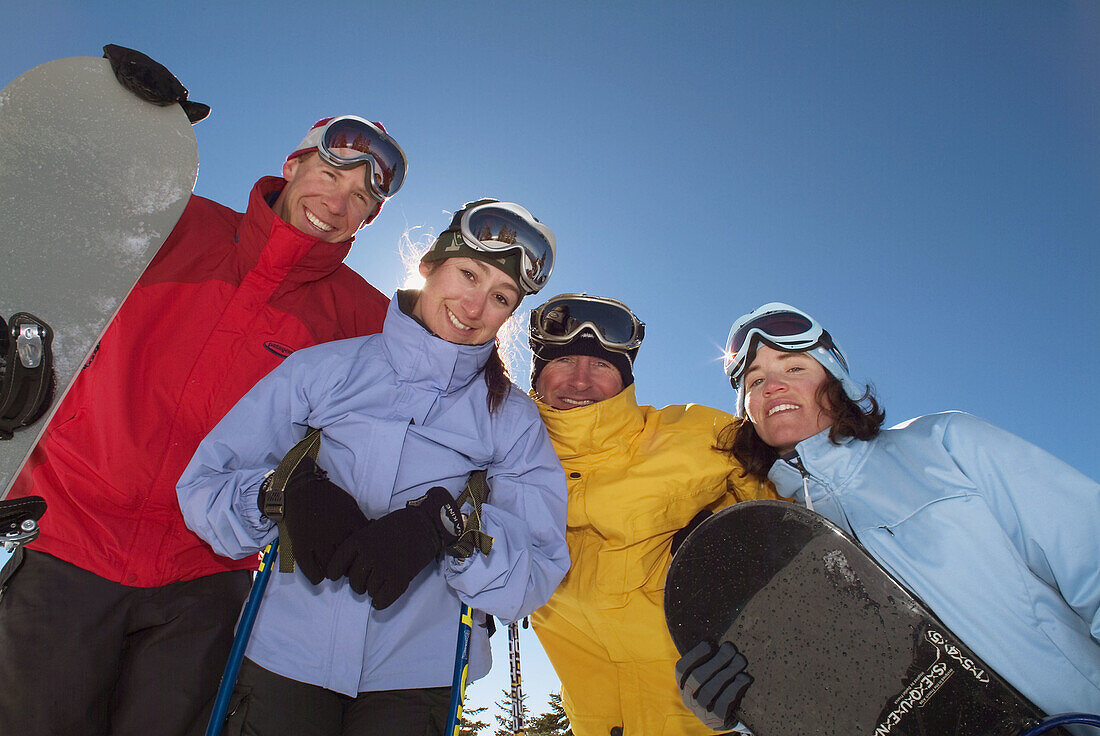 A group of friends skiing and snowboarding together at Diamond Peak. Nevada. USA
