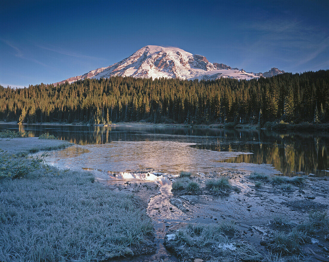 Morning light on Mount Rainier and Reflection Lake. Mount Rainier National Park. Washington. USA.