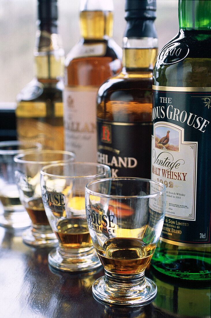 Taste at Glenturret whisky distillery, from the Edrington group. Scotland. UK.