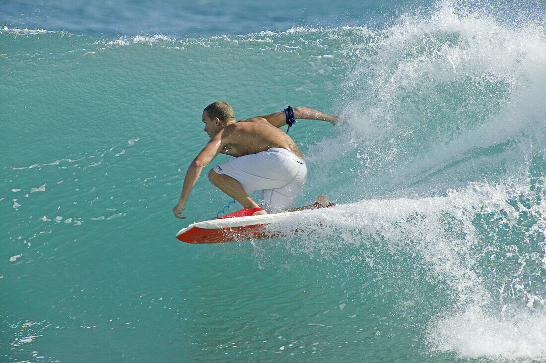 Man boogie boarding. Shipwreck Beach, Poipu area. Kauai. Hawaii. USA