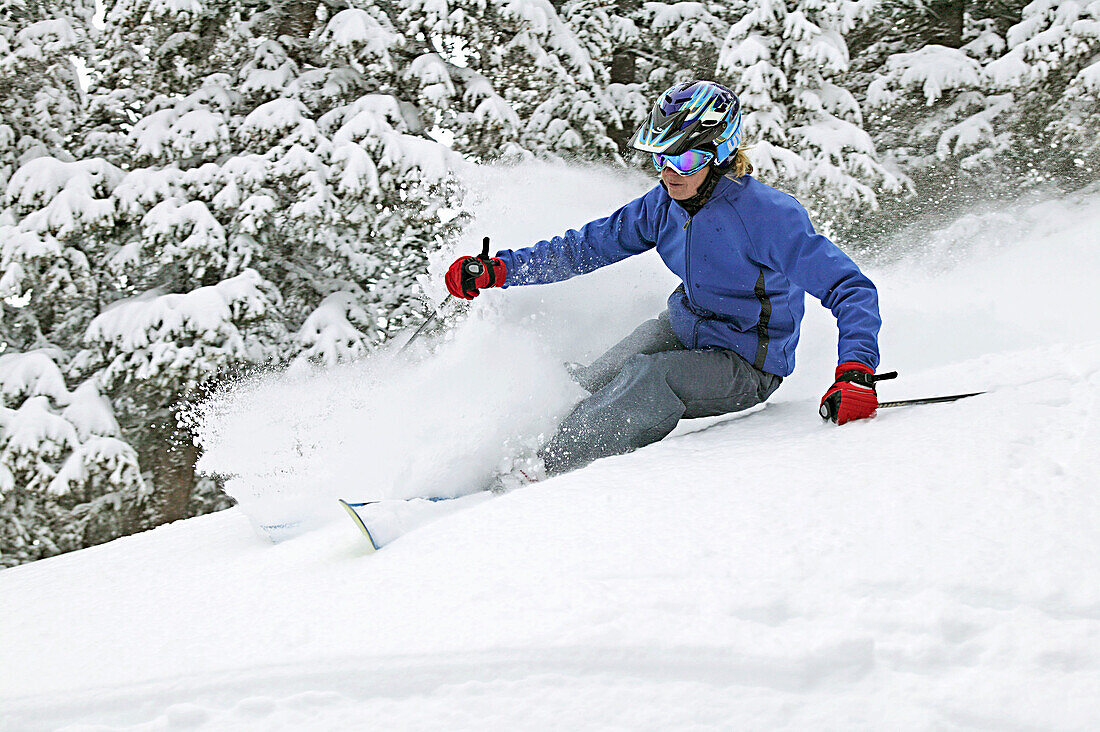 Woman skiing in Taos, New Mexico. USA
