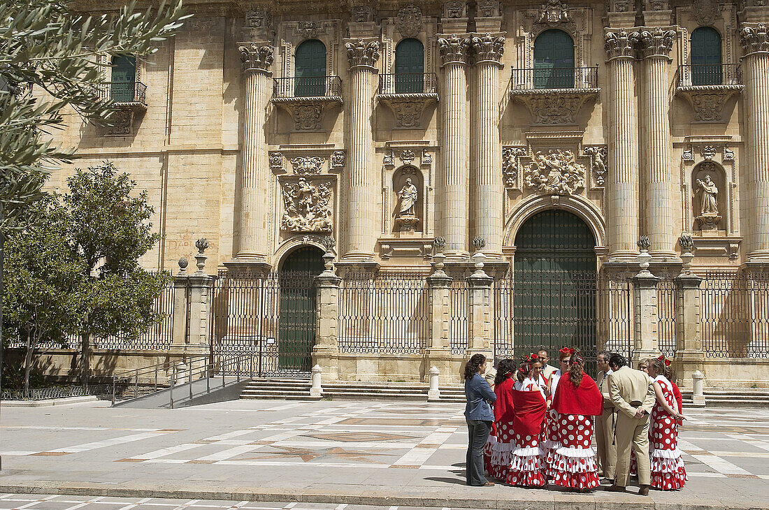 People in traditional costume in front of the cathedral (16th century), Jaén. Andalusia, Spain