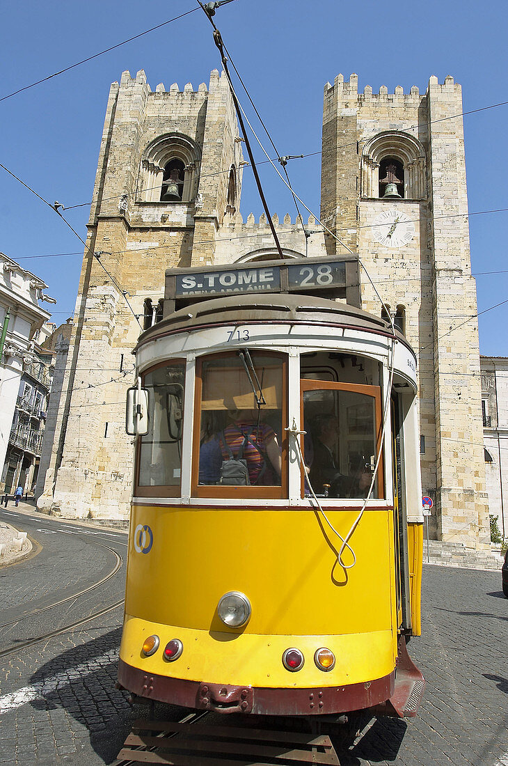 Tram and Sé cathedral in background, Lisbon. Portugal