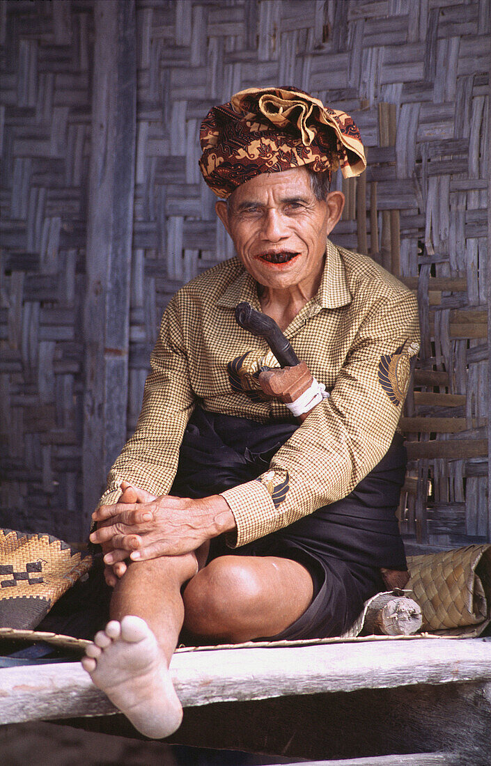 Old man in traditional clothes. Sumba, Indonesia
