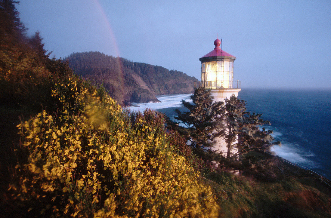 Rainbow over Heceta Head lighthouse. Oregon coast. USA.