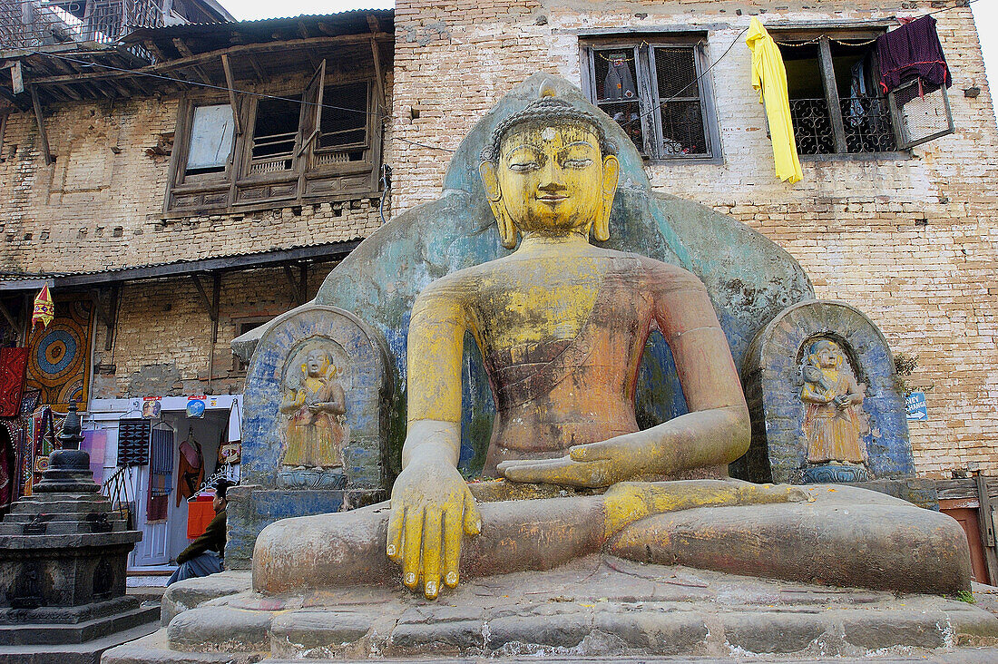 Giant Buddha in Swayambhunath temple. Kathmandu, Nepal
