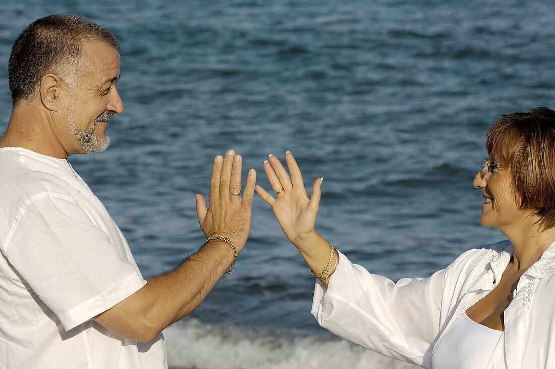 Middle-aged couple on the beach