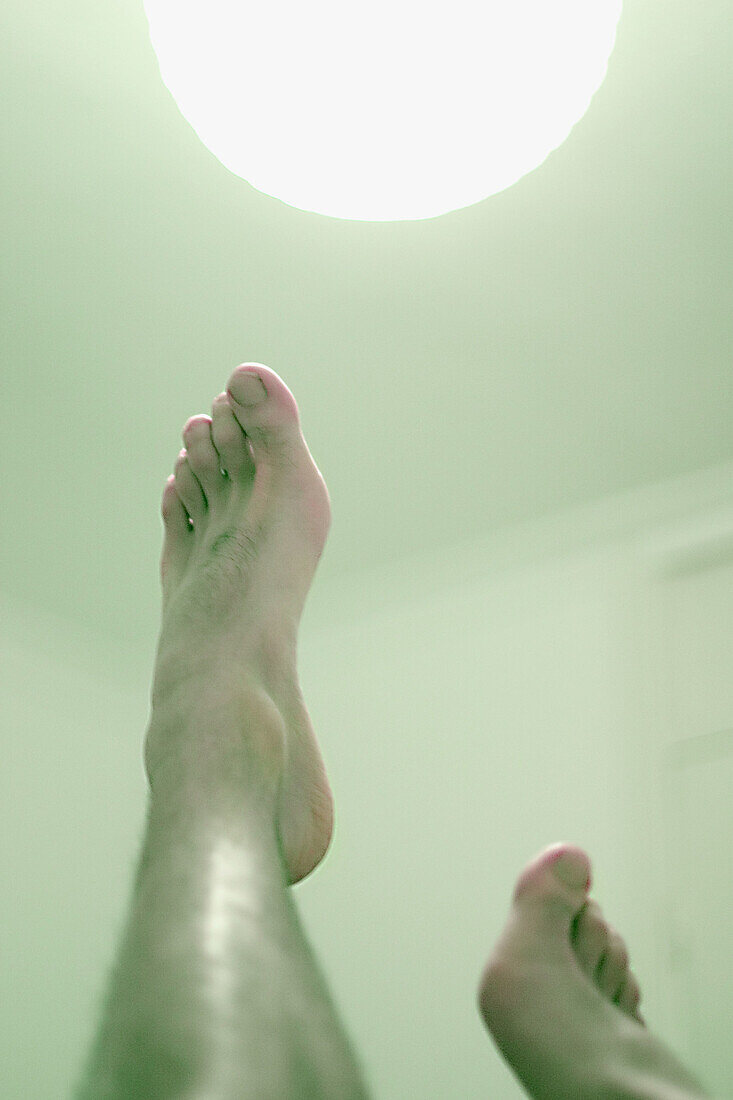 Feet reaching the light.