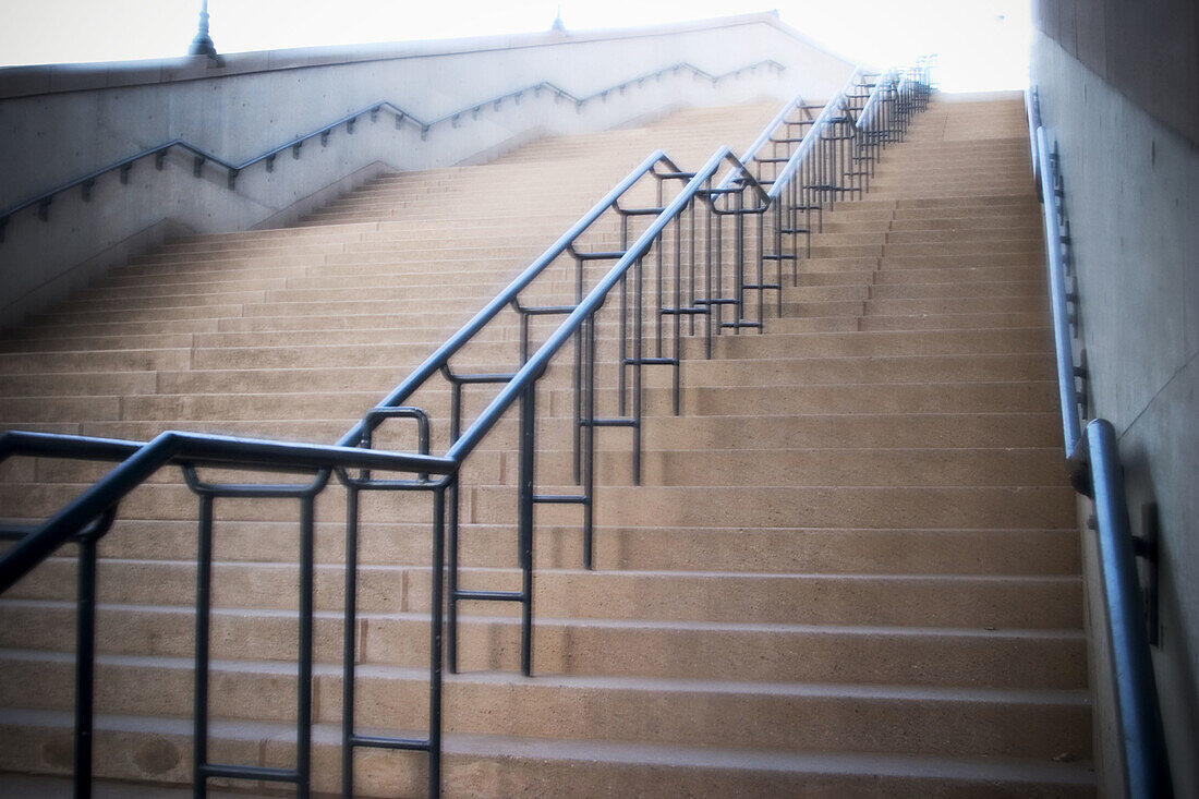 Concrete stairs and metal hand railing