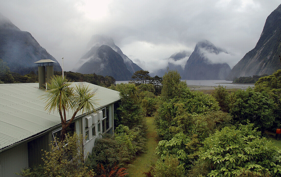 View of cloudy Milford Sound from Milford Lodge, Fiordland National Park, New Zealand.