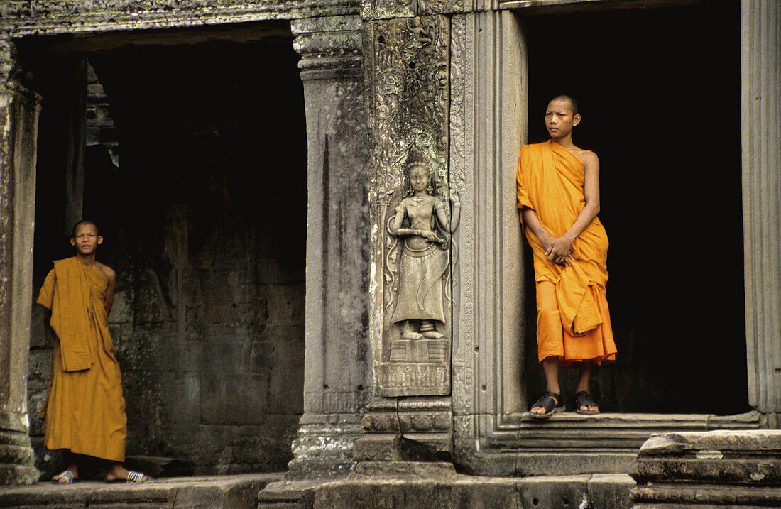 Young monks in Bayon Temple, Angkor, Siem Reap. Cambodia
