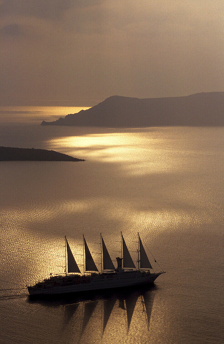 Golden Sunset on the Caldera. Fira. Santorini Island. Greece