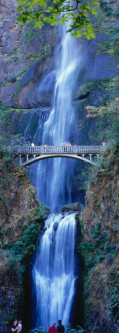 Tourists at waterfall, Multnomah Falls, Columbia River Gorge, Oregon, USA