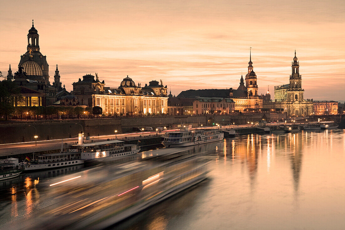 View along river Elber with Bruhl's Terrace, Academy of Fine Arts, Dresden Castle, Standehaus and Hofkirche at night, Dresden, Saxony, Germany