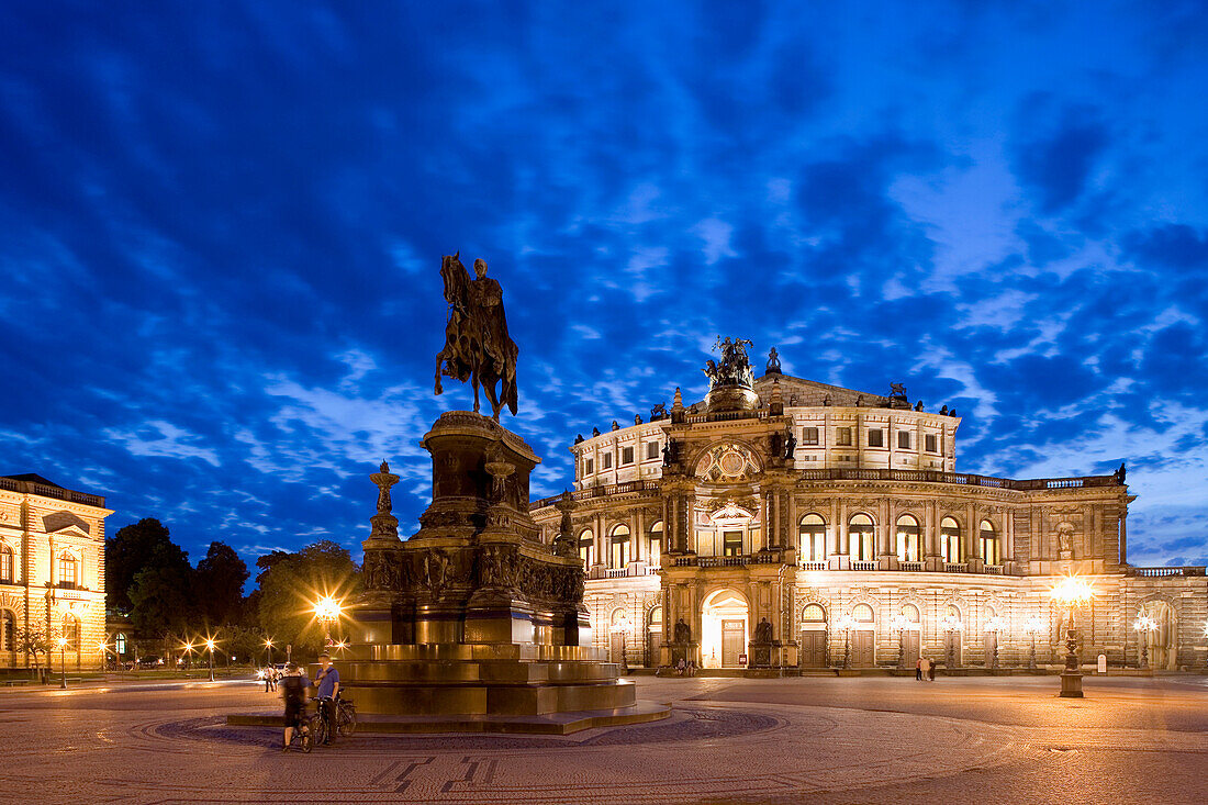 Theater square with Semperoper and King John monument at night, Dresden, Saxony, Germany