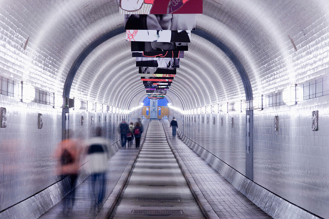 Pedestrians in the Old Elbe Tunnel, Hamburg, Germany