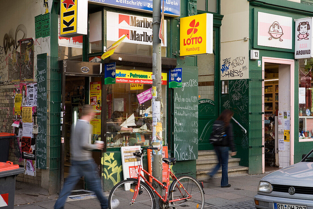 Kiosk with graffiti and advertisement in Susannenstrasse in Schanzenviertel, Hanseatic city of Hamburg, Germany, Europe