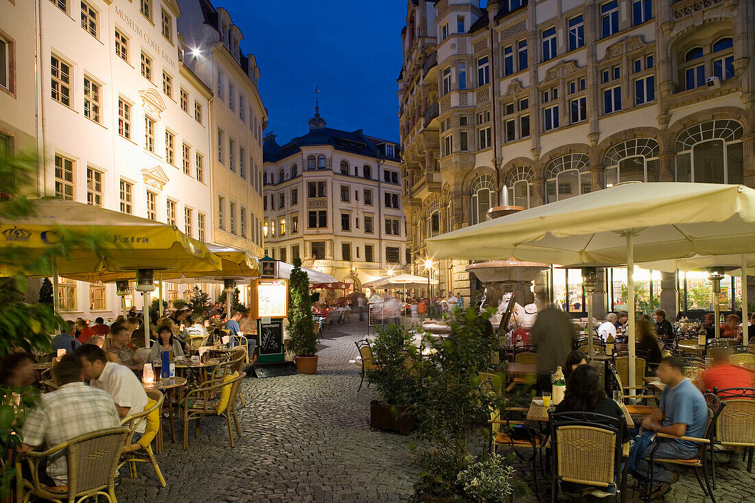 Guests sitting in pavement cafes in the evening, Leipzig, Saxony, Germany