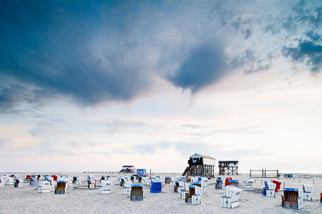 Beach chairs at beach, St. Peter-Ording, Schleswig-Holstein, Germany