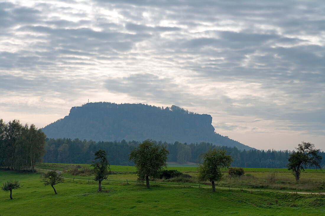 View at mount Lilienstein under clouded sky, Saxon Switzerland, Elbsandsteingebirge, Saxony, Germany, Europe