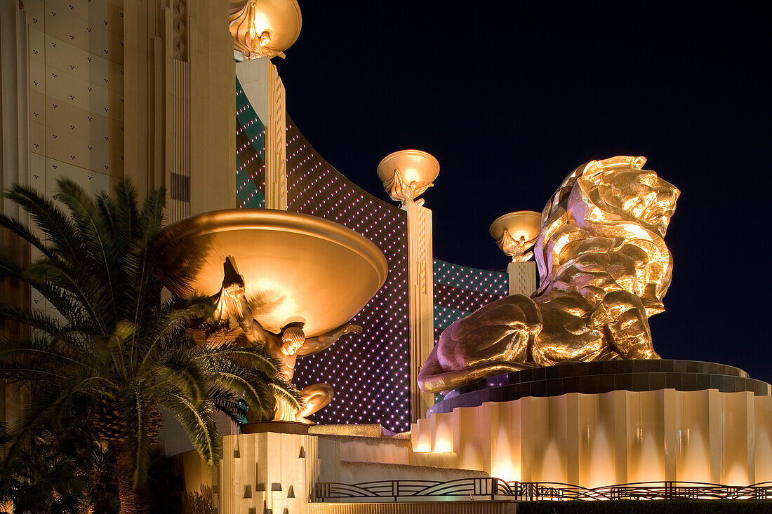 Light reflecting off the basins, statues and fountains which decorate the grand facade of the MGM Grand Hotel and Casino, Las Vegas, Nevada, USA