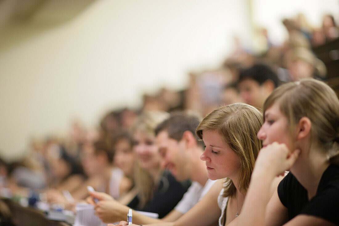 Students attending a lecture, Lecture theatre, Auditorium, University, Education