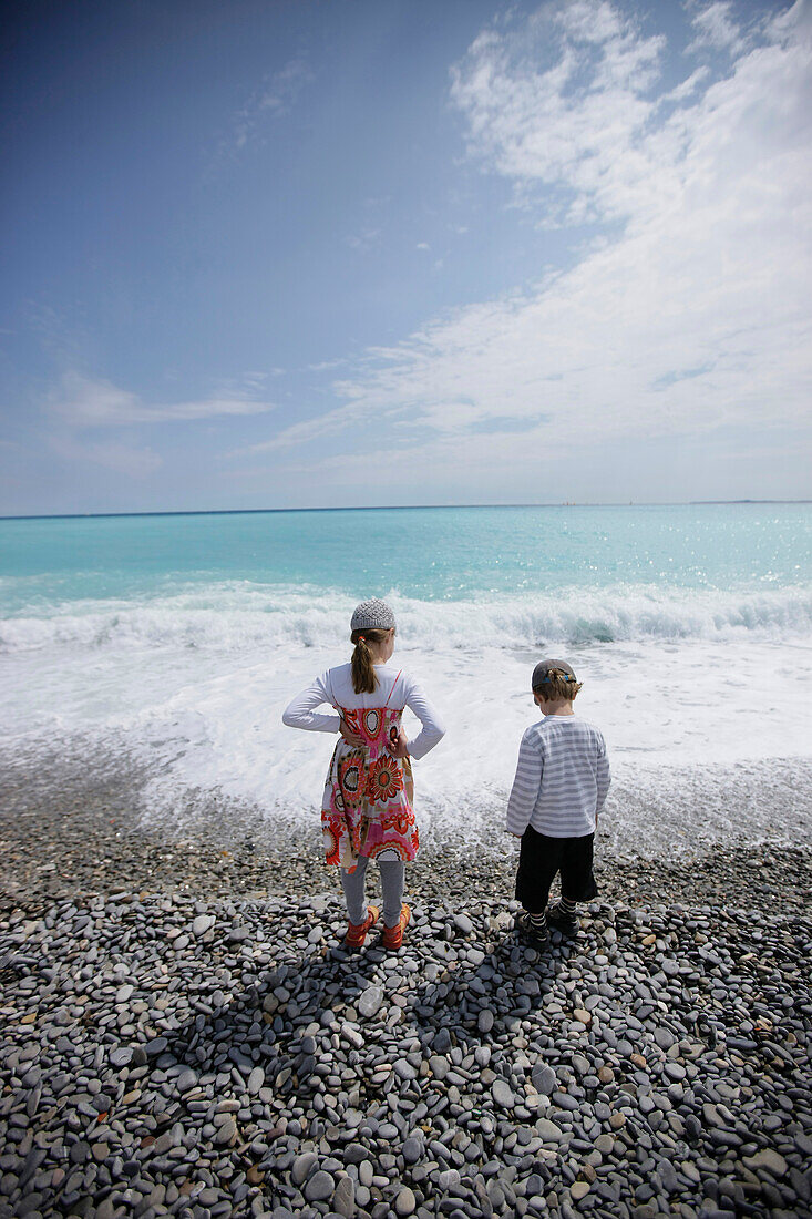 Girl and boy on the beach at Nice, Cote d'Azur, Provence, France