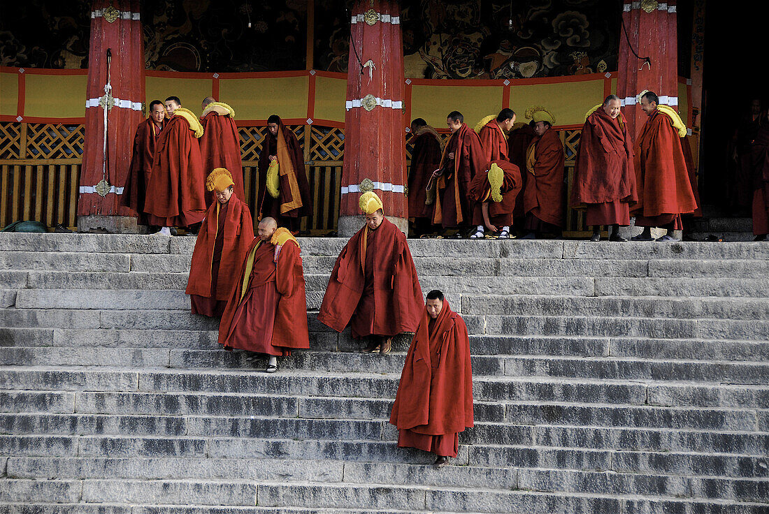 Gelukpa school. Lama going out from a ceremony. Drepung monastery. Lhasa. Tibet