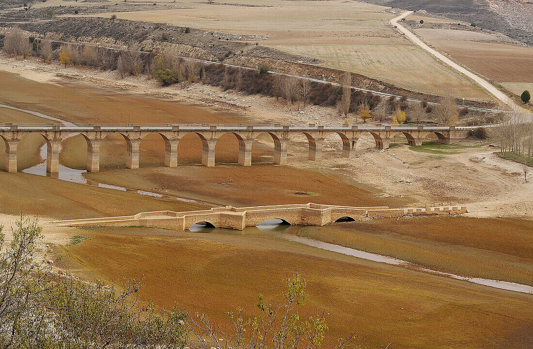 Maderuelo, Viaduct and old bridge over dried reservoir of Linares del Arroyo. Segovia province, Castilla-León, Spain