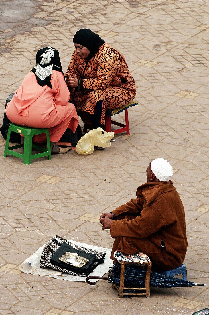 Fortune tellers working on the Jemaa El Fna Square, Marrakech, Morocco