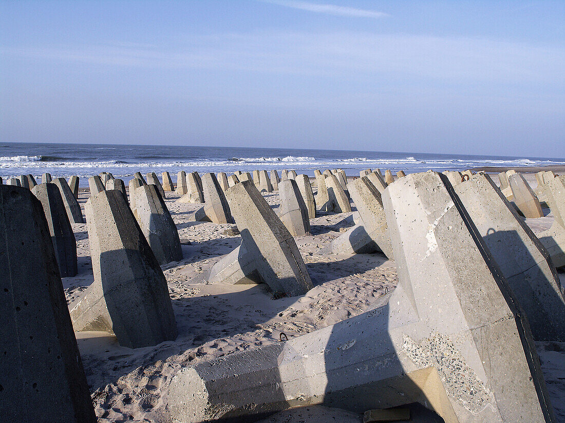 On the west coast of Jutland in Denmark, the coast is protected against erosion from the north sea with big concrete blocks