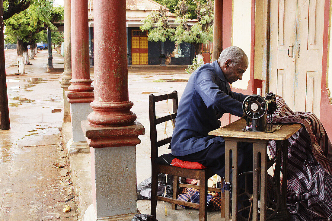 Dressmaker on the street. Mozambique.