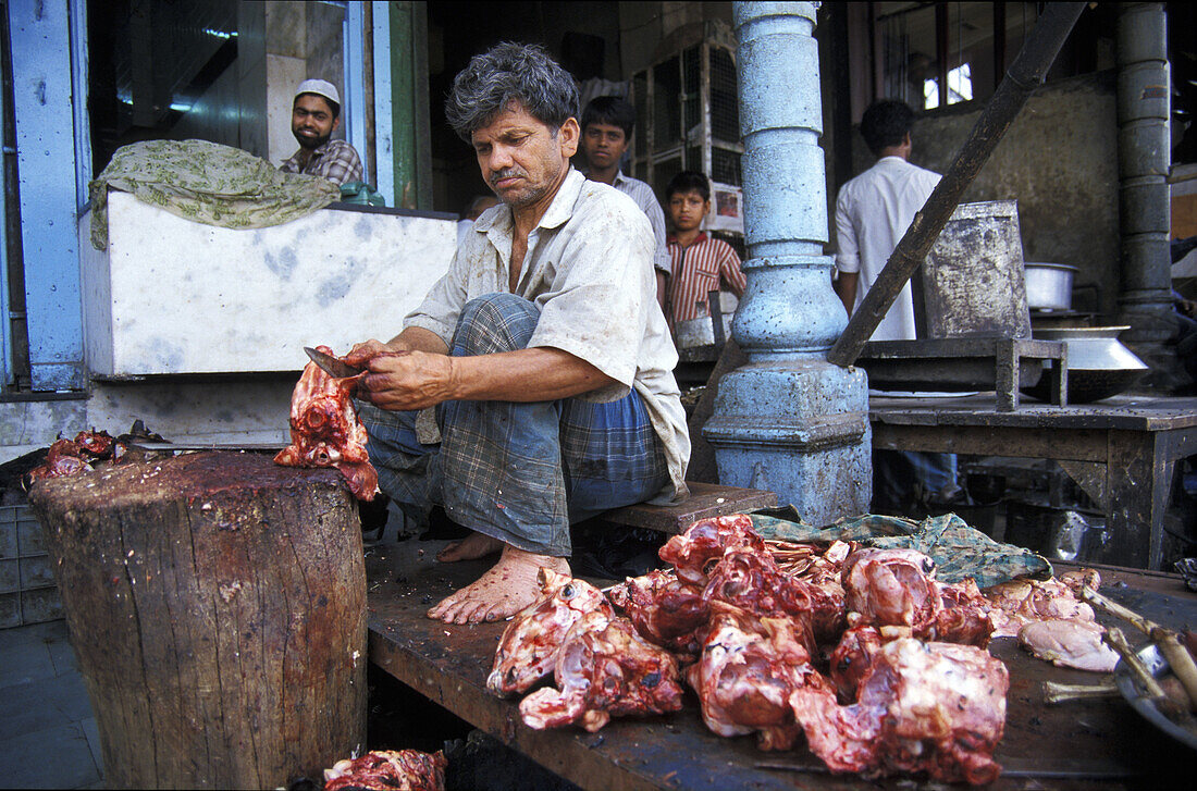 Butcher in Chandni Chowk market, New Delhi. India