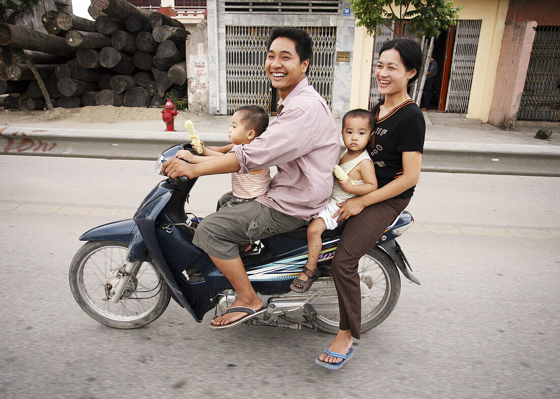 Family on motorcycle. Hanoi. Vietnam.