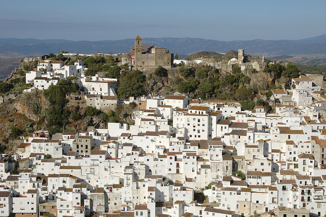 The church on top of the hill is Iglesia de la Encarnacion.Casares is a tipical white village near Costa del Sol. It seem like a treasre shinning under the strong Andalucian sun.