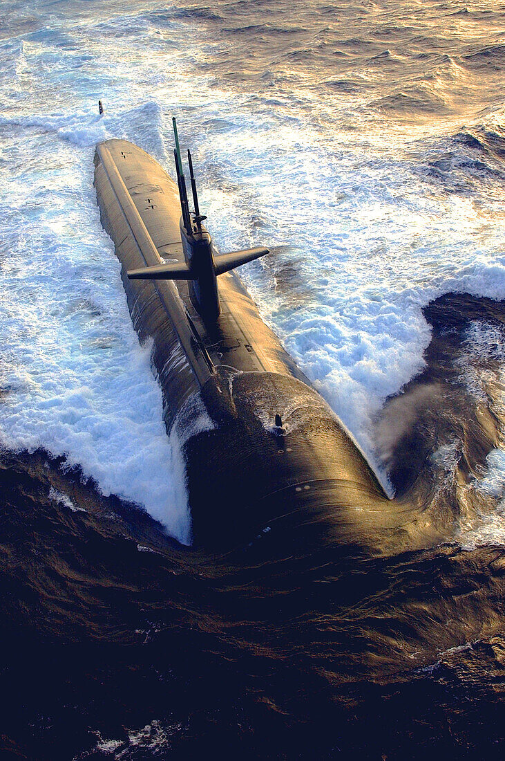 Los Angeles-class submarine USS Albuquerque (SSN 706) surfaces in the Atlantic Ocean