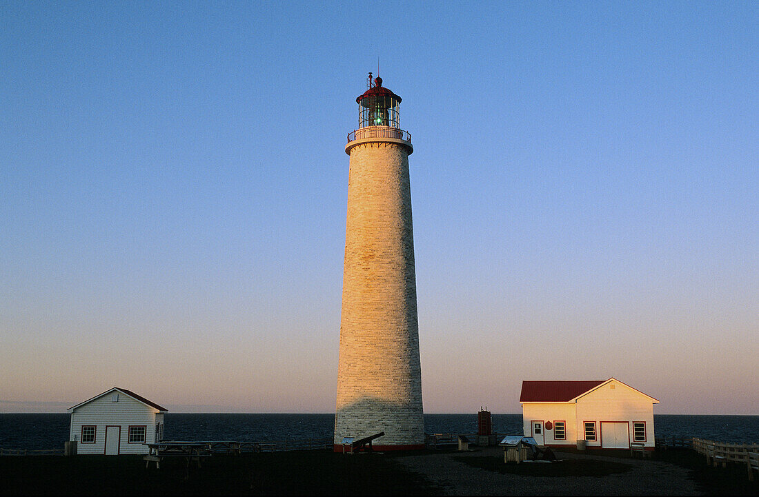 Lighthouse at sunset, Cap des Rosiers, Gaspesie, Quebec, Canada