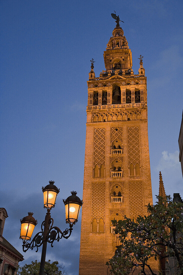 Street lamp and Giralda tower, Sevilla. Andalusia, Spain