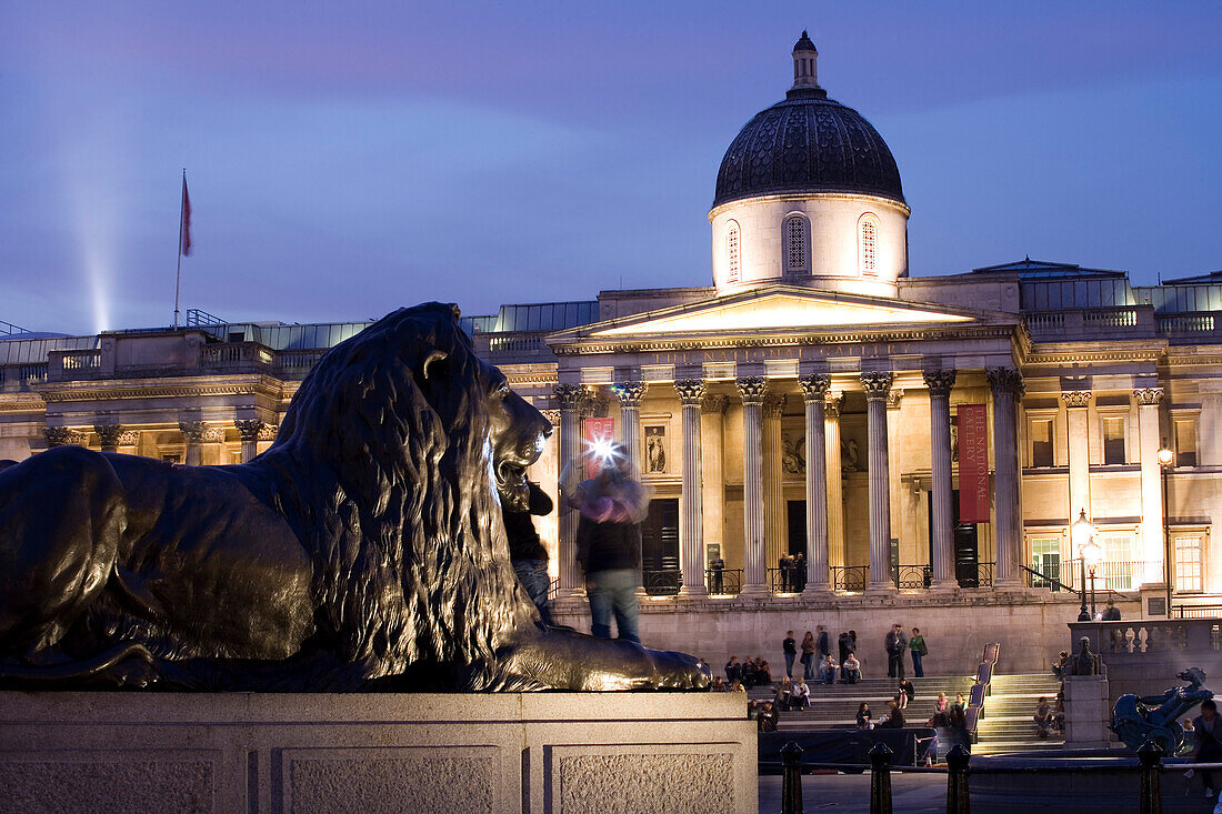 Trafalgar Square with lion statue and National Gallery, London, England, Europe