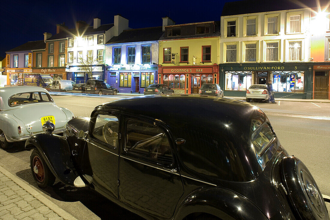 Vintage cars parked in the small town of Kenmare, County Kerry, Ireland, Europe