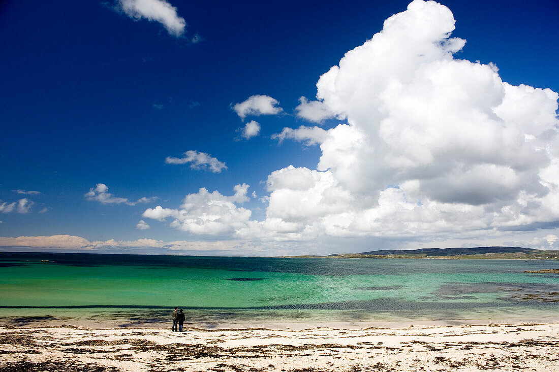 Couple on the beach at Connemara, County Galway, Ireland, Europe