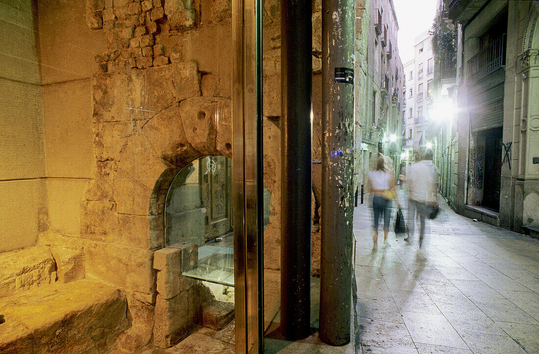 Wall and town gate of Barcino Roman city (1st-4th century a.D.), Pati Llimona, Regomir Street. Barcelona. Catalonia, Spain