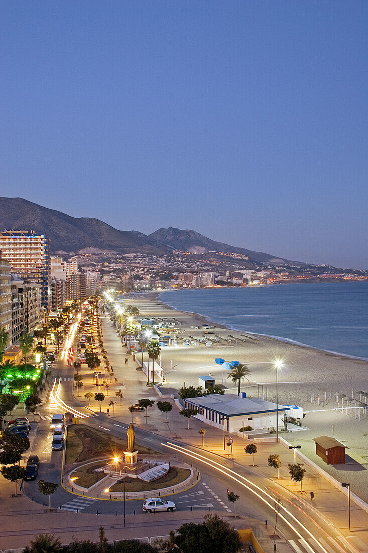 Beach front and promenade in the evening, Fuengirola. Málaga province, Costa del Sol. Andalusia, Spain