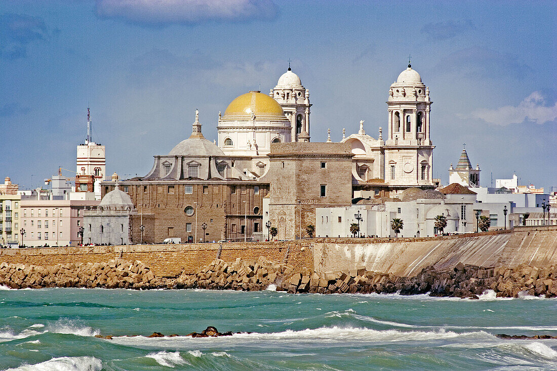 Playa  de la cortadura. Cathedral background. Cadiz, Costa de la Luz, Andalusia, Spain.