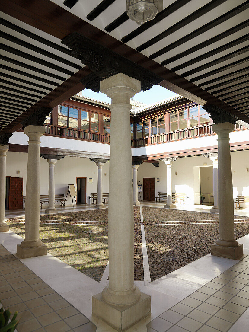Restored interior courtyard (built in 1699) of the Palacio de los Condes de Valdeparaiso, Almagro. Ciudad Real province, Castilla-La Mancha. Spain