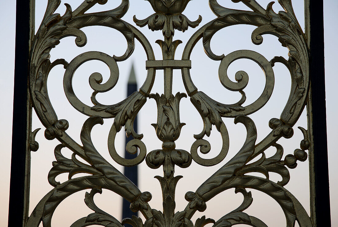 Tuileries Gardens, detail of park gate with Place de la Concorde obelisk. Paris. France