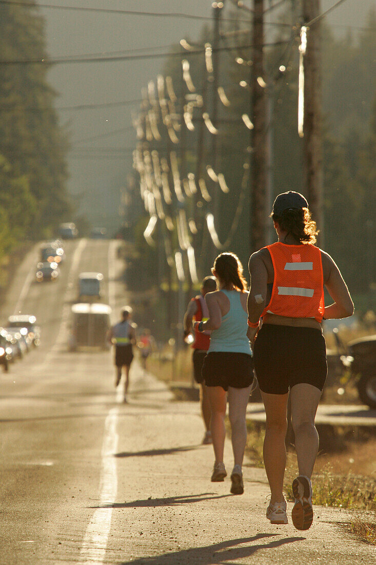 Runner near Sandy, relay race from Mount Hood to the coast, Oregon, USA