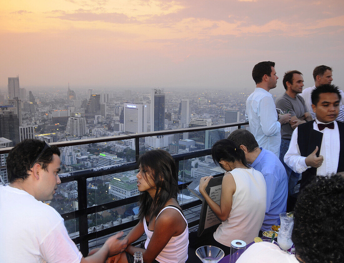 Evening drinks in the Moon Bar with stunning views from Sukhothai Hotel, Bangkok, Thailand